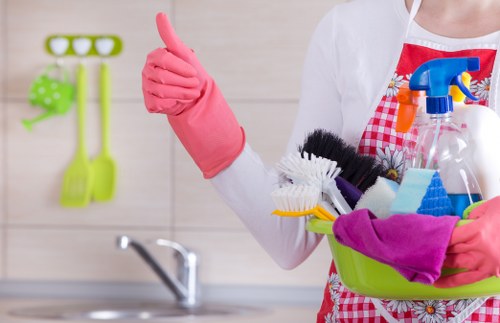 Cleaner preparing a workspace with hazard awareness